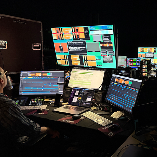 Video operator controlling what feeds are broadcasted to main scereen  