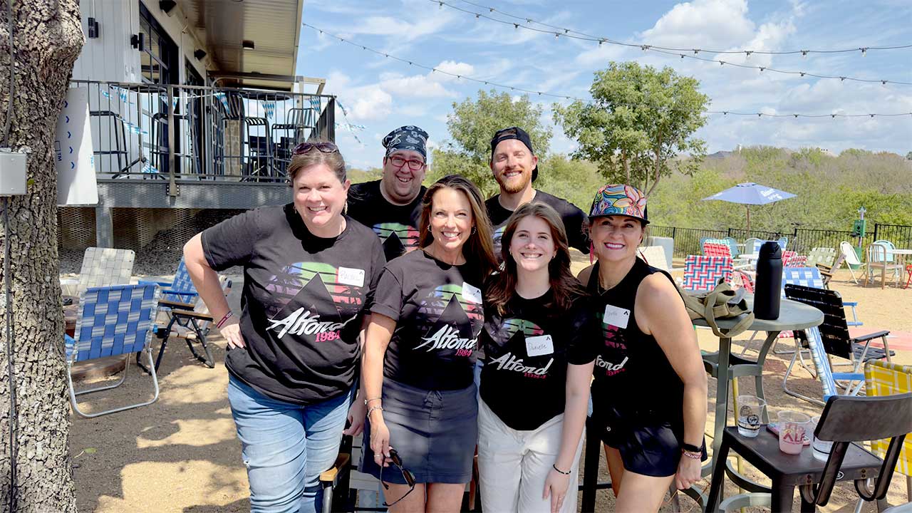 Above and Beyond employees at company event